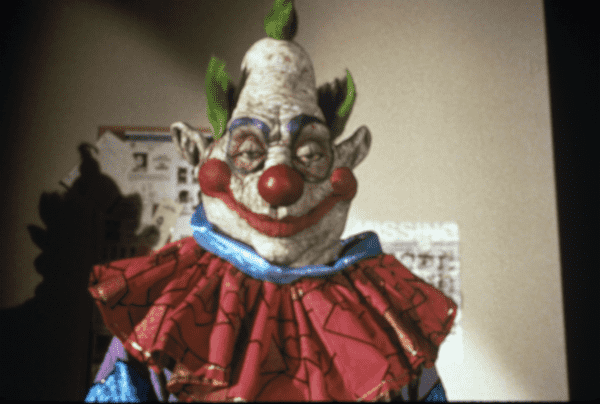 One of the title characters from the movie "Killer Klowns from Outer Space". This guy with a pear-shaped head has a slightly sinister look and he is definitely thinking about drinking your blood.