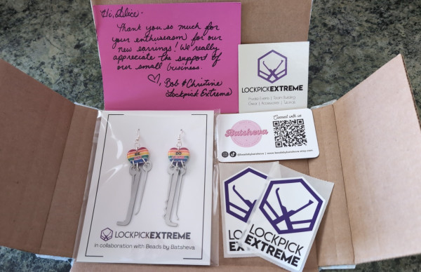 Lockpick Extreme Pride earrings unboxing pic.