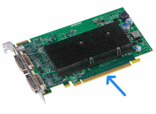 A PCB with a gold plated edge connector, and an arrow pointing to the relevant feature.