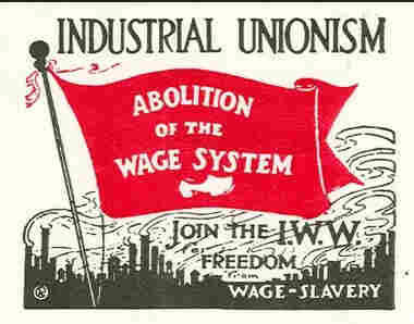 IWW silent agitator (sticker) with a red flag that reads: Abolition of the wage system, with a white sabot at the bottom). Across the top of the sticker it says: Industrial Unionism. At the bottom it says: Join the IWW. Freedom from wage slavery. In the background, smokestacks spewing smoke.