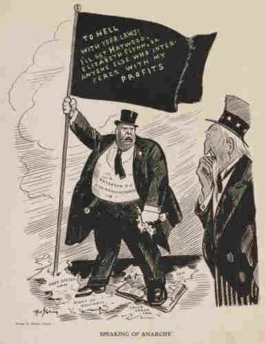 Political cartoon of a silk producer who is holding a flag on which is written "To hell with your laws! I'll get Haywood. Elizabeth Flynn, or anyone else who interferes with my profits." By Art Young - The Masses ( Vol. 4, No. 9 ), New York: The Masses Publishing Co., 1913-06https://library.brown.edu/cds/repository2/repoman.php?verb=render&amp;id=1362685292859766&amp;view=pageturner&amp;pageno=15, Public Domain, https://commons.wikimedia.org/w/index.php?curid=75348246
