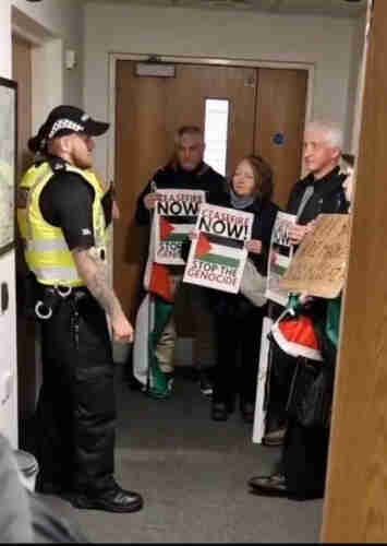 photo from the video of scottish protestors 'storming' some government building idk im a dumb american anyway they all appear to be 70 years old