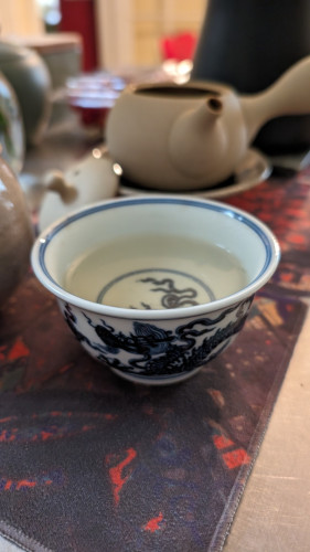 Green tea in a dragon bowl