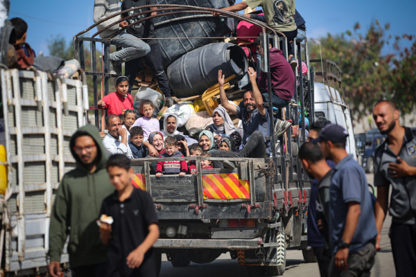 Displaced Palestinians flee Rafah with their belongings to safer areas in the southern Gaza Strip on May 7, 2024, following an evacuation order by the Israeli army the previous day: