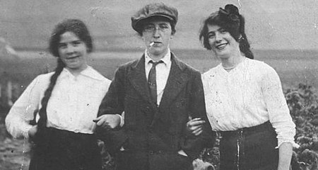 Margaret Skinnider is seen here in the center of this photograph, in men's clothing