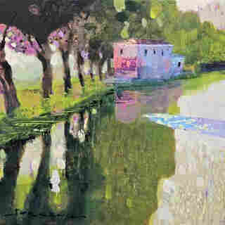 Colourful creative painting of a canal in the foreground and on the right in the painting, The shore on the left is coloured bright light green, and there are many trees in various shades of green, but also some pink. The green of the trees is reflected in the canal. In the background is a mainly soft purple and light blue coloured building on the shore. 