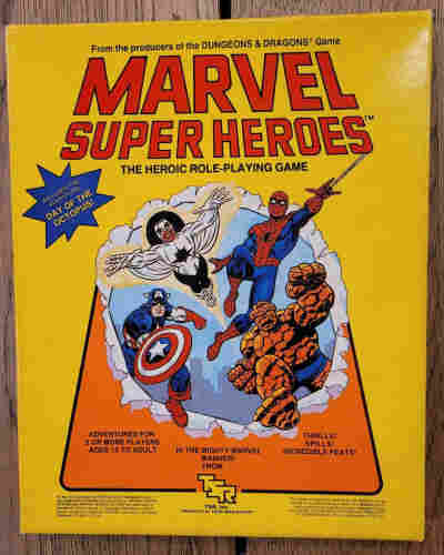 A photo of the 1984 Marvel Superheroes RPG boxed set, from TSR. So yellow. So very, very yellow.