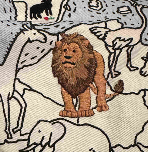 A small embroidered lion