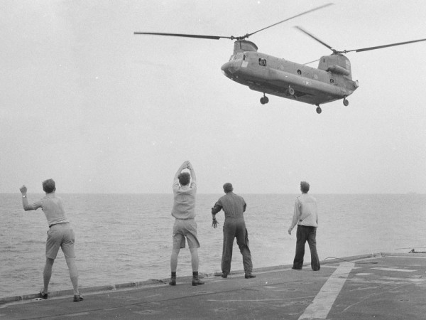 A Chinook Helicopter with refugees being waved off that wanted to land on the USS Kirk during the fall of Saigon.