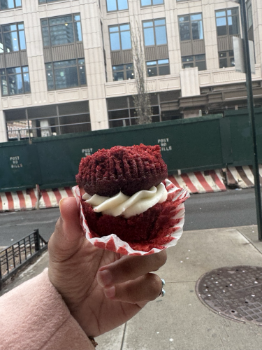 red velvet cupcake. the bottom removed and placed on top to make a sandwich. 