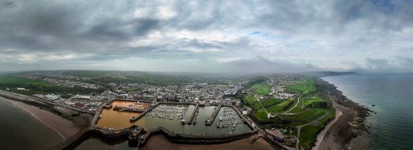 Panoramic view over harbour, sea and town scape