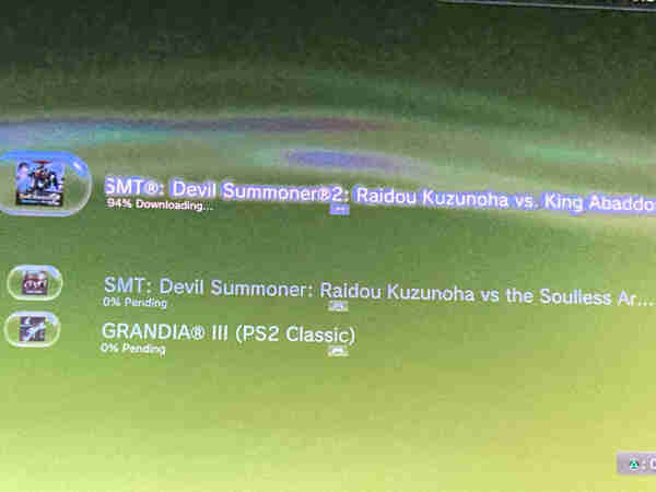 Terrible looking screenshot of my tv, which somehow turned green for some reason.
Showing Shin Megami Tensei Devil Summoner Raidou 1 and 2 as well as Grandia 3 downloading on PS3 as PS2 Classics.