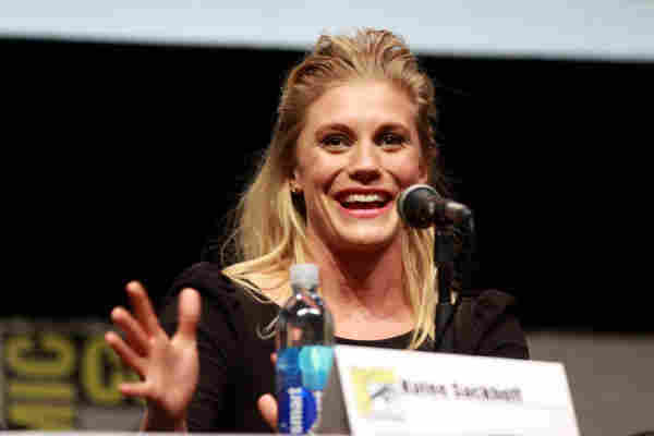 Katee Sackhoff sitting and speaking at an unknown convention, unknown date. 
