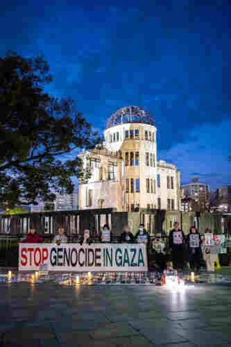 “Stop Genocide in Gaza”

Standing a group of people in front of A-bomb Dome, Hiroshima