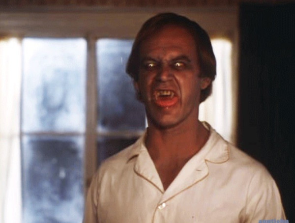 Geoffrey Lewis in the movie Salem's Lot.  A man turned into a vampire with glowing eyes.