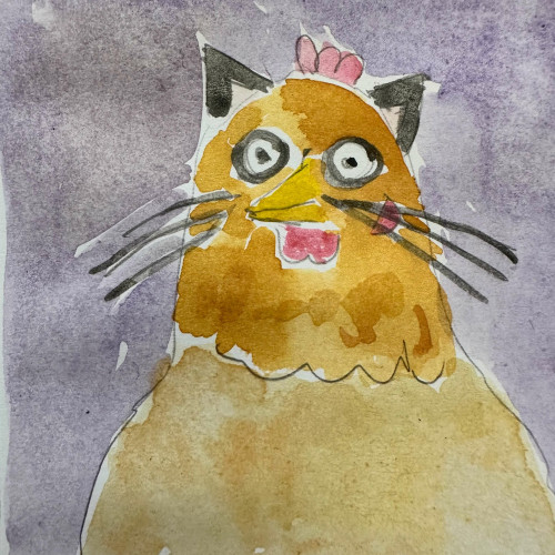 A brown chicken with cat ears and whiskers.