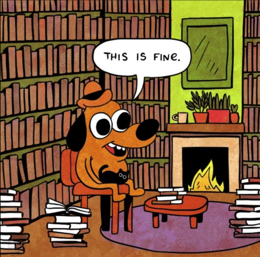 The cartoon "this is fine" little dog (as originally drawn by K.C. Green) in this version by penpanoply, the dog, who is normally in a burning room, sits instead in nice library surrounded by piles of books, a fireplace, house plants, and a black cat on their lap. The little dog says "This is fine."