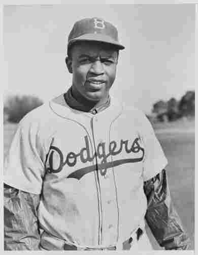 Robinson, 1950, in Brooklyn Dodgers uniform. By United States Information Agency - This tag does not indicate the copyright status of the attached work. A normal copyright tag is still required. See Commons:Licensing., Public Domain, https://commons.wikimedia.org/w/index.php?curid=27757215