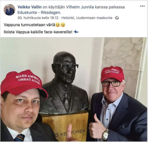 Facebook screenshot.

Two Finns MPs' Vilhelm Junnila (who later got kicked out of a ministry due to Nazi symbolism) and Veikko Vallin (a cantankerous millionaire who famously said no sane person pays taxes) next to statue of Kekkonen [the Finnish "lifetime" President, under which the democratic system degrated]. Both have MAGA-hats. The caption says "on Labour Day you declare your colours! Happy Labour Day to all facebook-friends!"