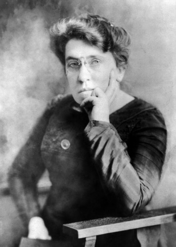 Photographic portrait of Emma Goldman, facing left. Cropped and restored from original Library of Congress version.