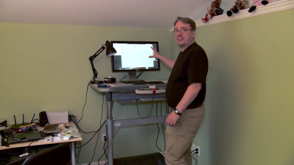 Linus Torvalds working on something with his standing desk 